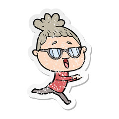 distressed sticker of a cartoon happy woman wearing spectacles