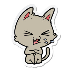 sticker of a cartoon cat hissing