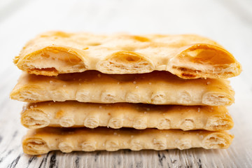 crispy crackers stacked up and the top cut into half