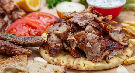 Shawarma, gyros pita, kebab. Traditional turkish, greek meat food on pita bread