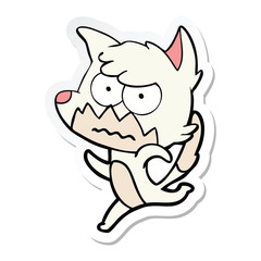 sticker of a cartoon annoyed fox