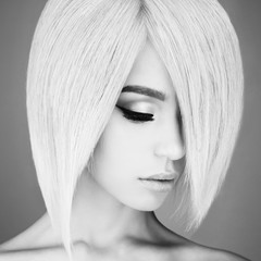 Lovely asian woman with blonde short hair