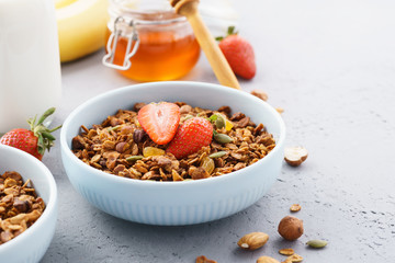 Homemade healthy oat granola with fresh berries.