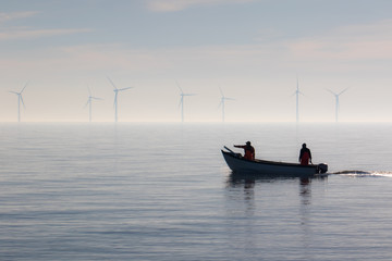 Sustainable resources. Small fishing boat heading out to sea.