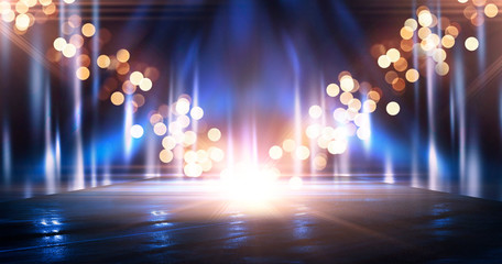 Wet asphalt, reflection of neon lights, a searchlight, smoke. Abstract light in a dark empty street...