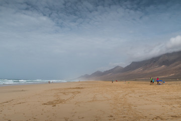 Fototapeta na wymiar Beautiful Beach Landscape with sand on a cloudy day