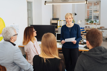 Woman addressing her speech to colleagues