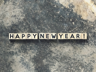 New Year Concept - HAPPY NEW YEAR written on wooden blocks.