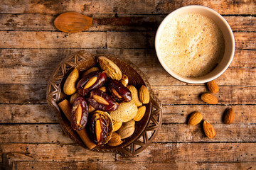 Coffee and snacks on a table top view