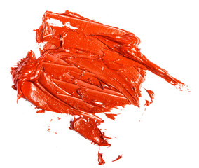 stain of red-orange oil paint on a white background.