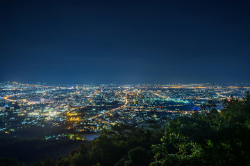 Fototapeta na wymiar City night landscape from the view point on top of mountain , Chiangmai ,Thailand