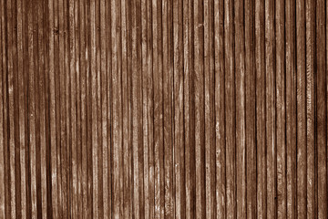Decorative wooden surface in brown color.