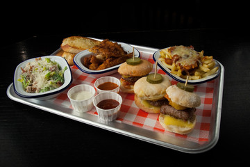 selection of dishes on tray for diner style restaurant