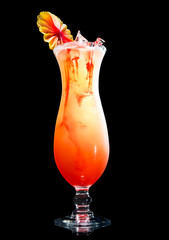 tequila sunrise cocktail on a black background