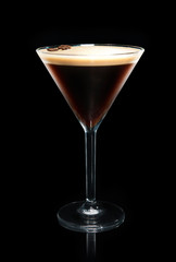 espresso martini cocktail on a black background