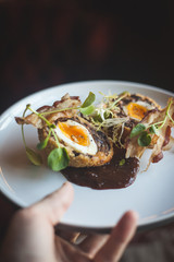 serving a Fancy scotch egg