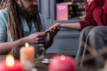 Close up of a female palm in male hands