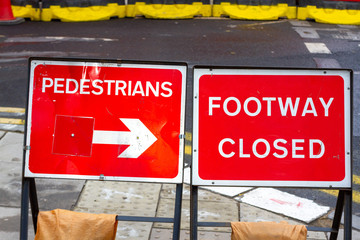 Pedestrians go to the right as the footway is closed there 