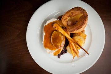 Roast dinner with Yorkshire pudding and seasonal vegetables