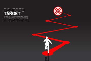 silhouette of businessman running on route to dartboard. Business Concept of route to goal.