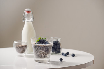 Chia pudding with fresh berries and almond milk. Superfood concept. Vegan, vegetarian and healthy eating diet with organic products