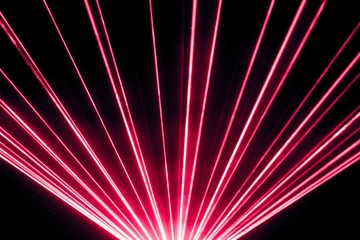 Red laser show nightlife club stage and shining sparkling rays. Luxury entertainment in nightclub...