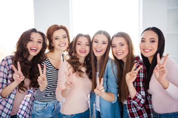 Portrait of her she nice-looking sweet adorable lovely charming attractive cheerful cheery ladies get-together showing v-sign dream in light white interior room indoors