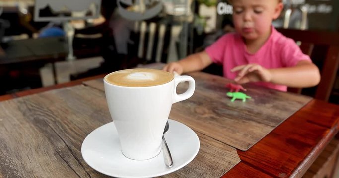 Cup flavored cappuccino company child