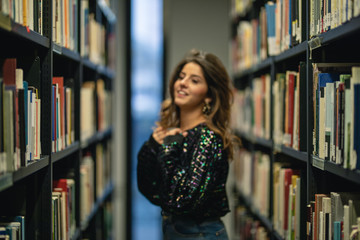 young woman in library