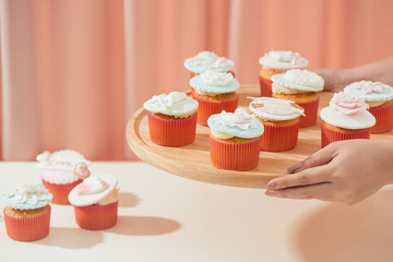 Fondant cup cake on white table