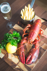 Cooked lobster with fries