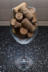 many wine corks in the glass