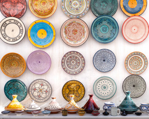 Traditional Moroccan market with souvenirs. Handmade ceramic plates