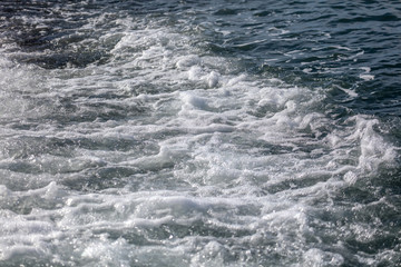 Waves on the seashore as an abstract background