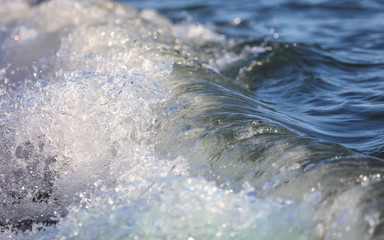 Waves on the seashore as an abstract background
