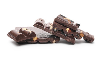 Chocolate bars with blueberries, hazelnuts and almonds isolated on white background
