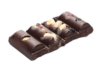 Chocolate bars with blueberries, hazelnuts and almonds isolated on white background