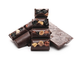Chocolate bars with blueberries, hazelnuts and almonds isolated on white background