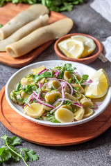 SEAWEED ULTE or HULTE. Chilean ulte salad ceviche with purple onion, coriander and lemon juice. Pacific edible seaweed