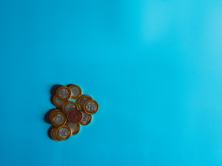 Chocolate coins on celestial background