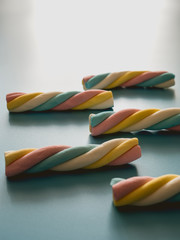 Candies with cloud shape on a blue background