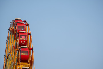 Ferris wheel with blue sky in Kobe, Japan