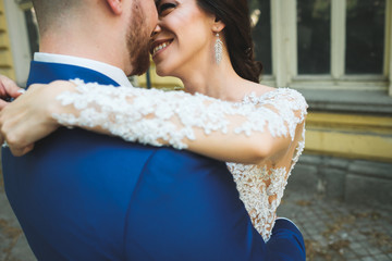 Bride and groom kissing