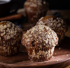 Pumpkin Muffins on a Wooden Plate