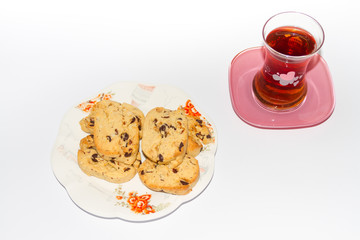 Enjoying cookies and tea
