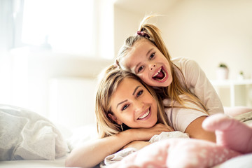 Stay in bed with me. Mother daughter time.