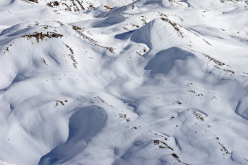 Fototapeta na wymiar Snow Covered Hills and valleys