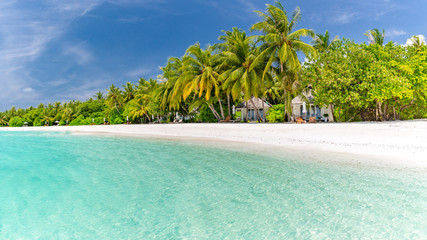Perfect tranquil beach scene, soft sunlight and white sand and blue endless sea as tropical landscape. Luxury resort hotel, vacation and holiday landscape