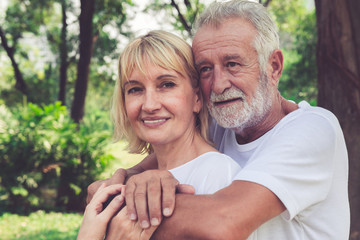 Happy senior couple relax in the park