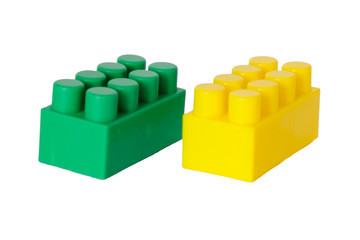 details of a children's plastic constructor on a white background. colored cubes. block.